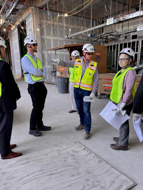 Court CEO Lee Seale and judges touring the new building under construction.
