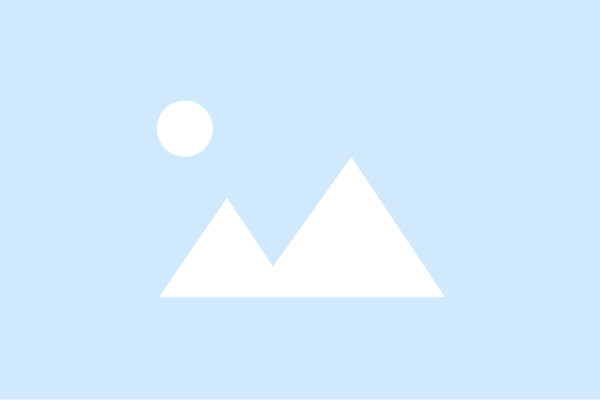 Place holder image for when an image hasn't been added. A minimalist icon showing two white mountains and a sun on a light blue background.
