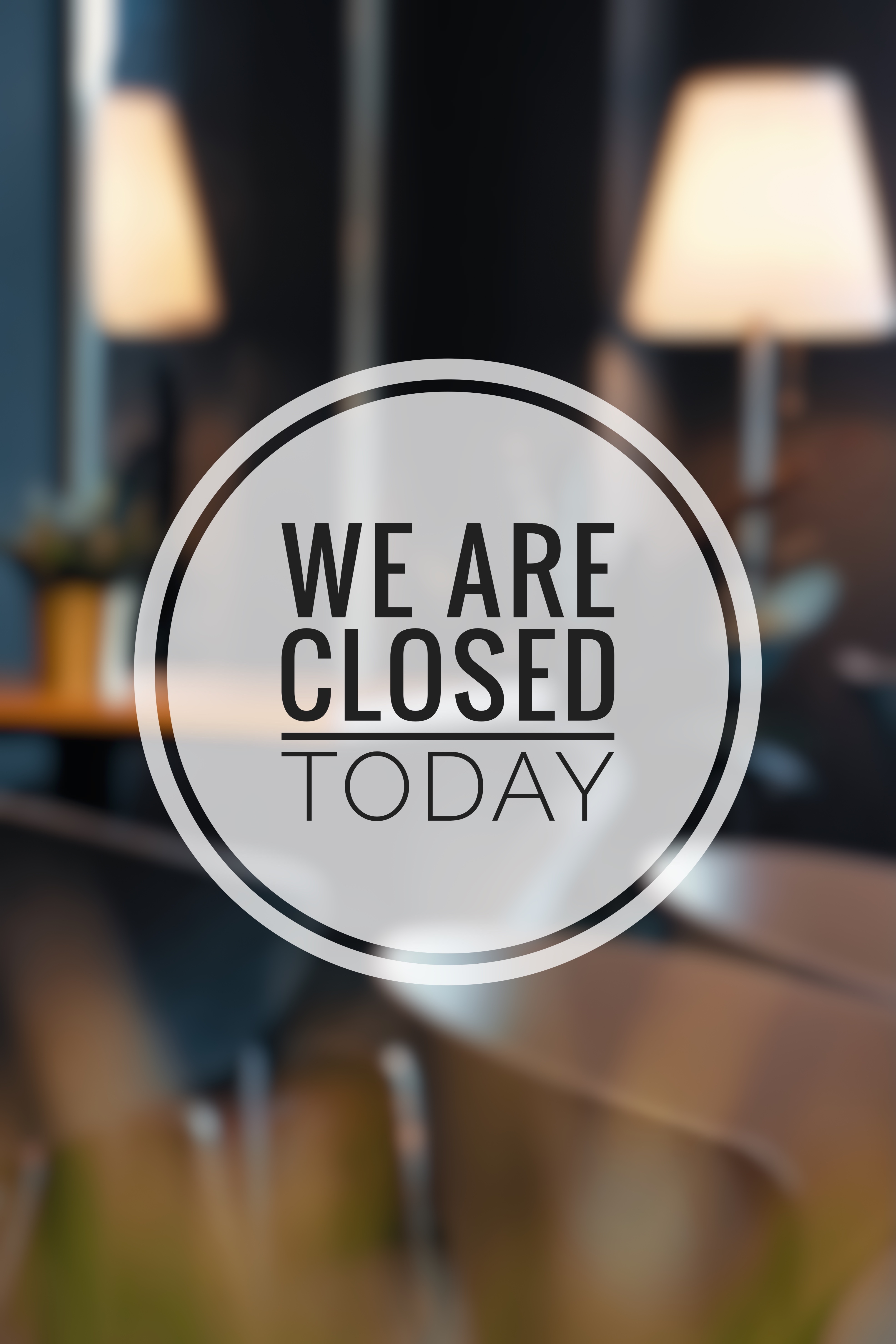 We are closed word concept on a blurred café background