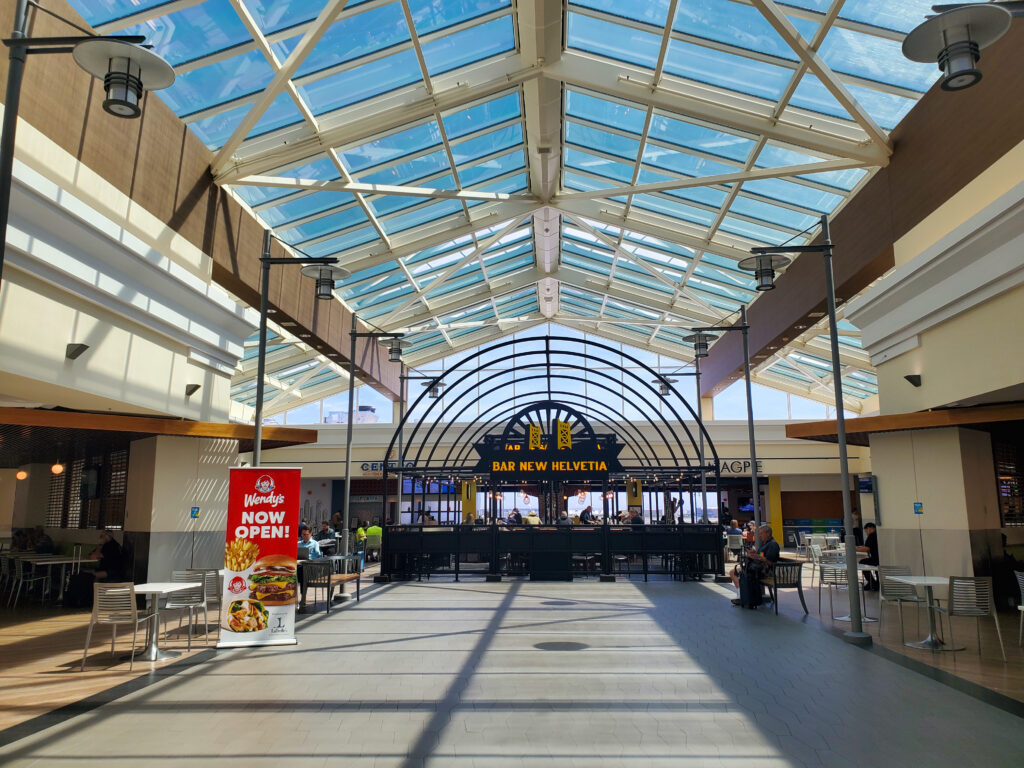 New restaurants in Terminal A (Bar New Helvetia, Magpie, Centro Cocina Mexicana) with skylight ceiling.